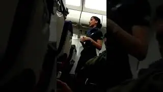 Man Ignoring Air Hostesses Instruction on Flight 