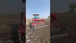 New Holland 5620 with 8ft super seeder
