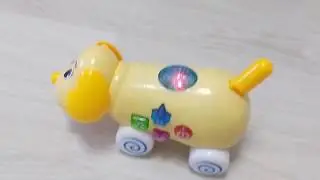 Развивающая собачка проектор BabyGo что подарить ребенку в год полтора года два года музыкальная