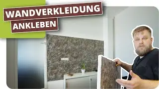 Wandgestaltung im Büro mit Steinoptik-Paneelen