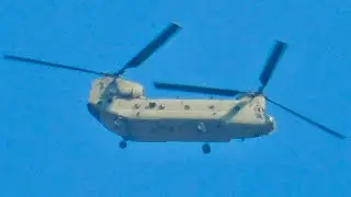Catching my first Chinook helicopter with my siblings!