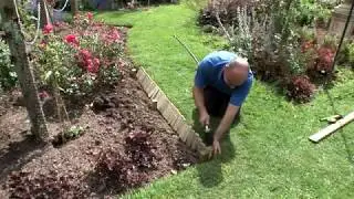 Forest Garden - How to install log roll edging (2019)