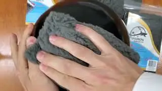 Removing oil from a bowling ball with the Sharkpa ™ bowling shammy