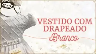 Vestido de festa infantil branco com pérolas e drapeado.