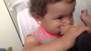 Mikayla smells Ariana's feet