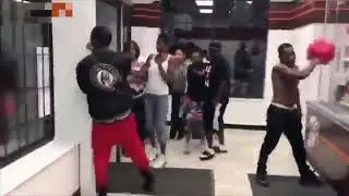 Dude tries to prank guy in little ceasers Detroit Wirh gasoline but got a gun to the face
