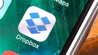 Dropbox surges 44% in trading debut