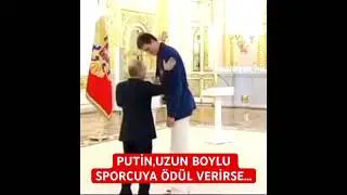 Putin’in uzun boylu sporcuya ödül verme anı…