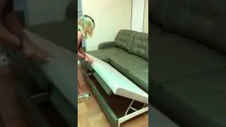 Диван угловой кожаный с оттоманкой 