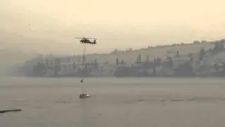 Black hawk helicopter with drop bucket