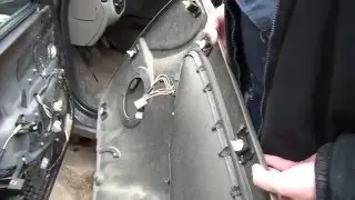 How to remove the front door panel on a Lada Kalina