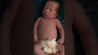 Baby Theodore smiling