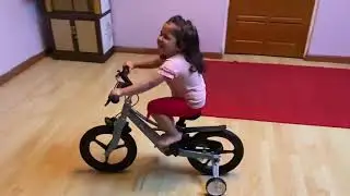 2.5 year old Ranita riding bike for the first time