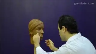 My female head sculpture - Bust statue made out of clay. Guncel Ozturk, MD 