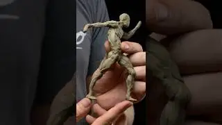 Sculpting A Gesture Study In Clay Onto Wire Armature 