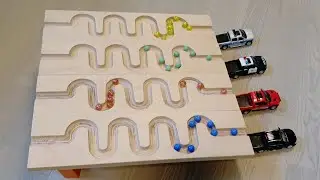 Marbles balls roll down 4 slopes and fall into 4 trucks Marble run race satisfying video