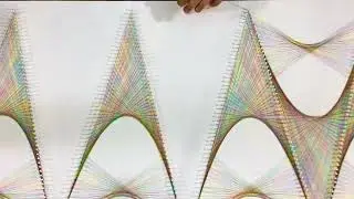 Rainbow thread work as a wall sculpture piece.