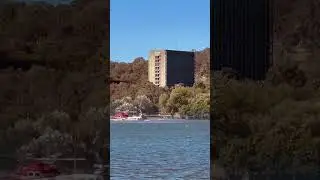 Water bombing helicopters filling in Lake Burley Griffin Canberra. Summer has entered the chat.