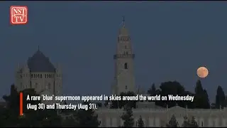 'Blue' Supermoon lights up skies worldwide