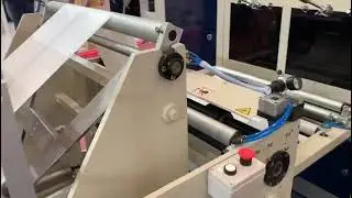 XL Plastic made high speed bag in roll making machine.