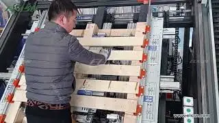 Automatic wood pallet nailing machine