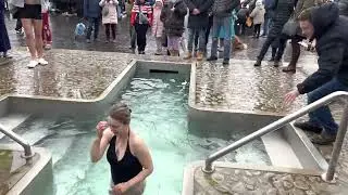 Baptism in spring water. Outside -7°C. Spring water +6°C