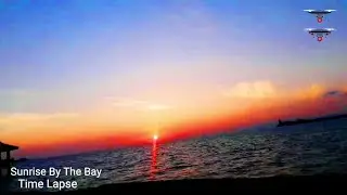 Sunrise By The Bay-The Amber Horizon (Time Lapse)/Carlos Marabillo