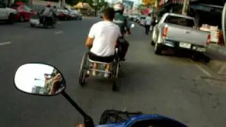 wheelchair motobike towing thailand style pattaya