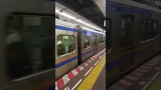 Passenger train in Fukuoka arriving at station | Japan railways