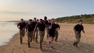 Watch: Secretary of Defense Pete Hegseth leads morning workout on Omaha Beach