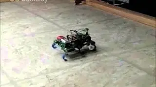 Precise Dynamic Turning of a 10 cm Legged Robot on a Low Friction Surface Using a Tail