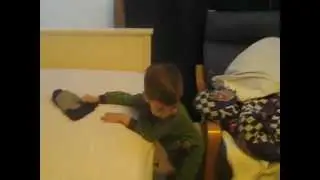 Rodik chases Denis with stocking hat