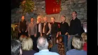 Coda singing 'Aul Lang Syne' from their album 'mouthmusic' with still images.