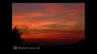 Black, orange, blue, pink, brown clouds, lighting chemtrails, double rainbows and a blue sun 26 May