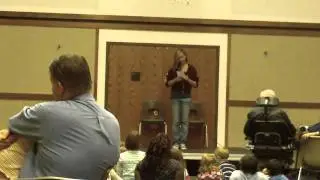 Jordan singing at a church function