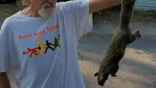 Crazy dude with a squirrel