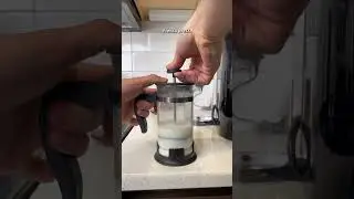 Make a latte using a nespresso 