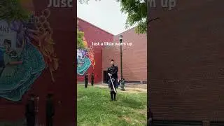 Doing a little warm up flourishing before stepping out for Drum Major competition in Woodland