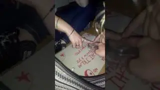Attempting to summon Zozo Ouija board demon and other spirits.