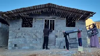 Buying doors and windows from the market for the winter house by Abbas