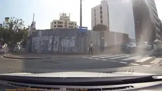 Woman crossing the road like an imbecile