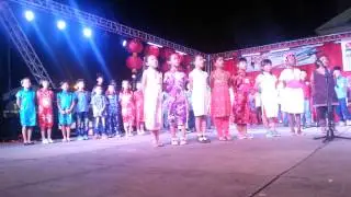 Kids singing national anthem of Suriname