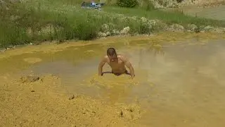 Mud sink play fetish. Oiled Body sink in Quicksand