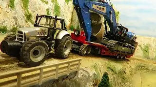 Tractors and Excavator in Action