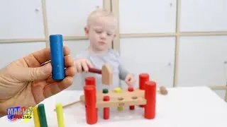Marley Learning Colors Blue, Yellow, Red, Green  - Hammer Pounding Pegs - Marley Learns Colours