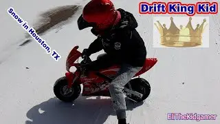 kid drifting motorcycle in snow. Houston, TX