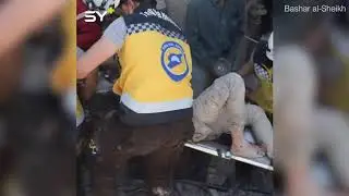 Upsetting scenes as Syrian girl tries to save sister after airstrike