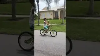 son rides bike with one hand #shorts