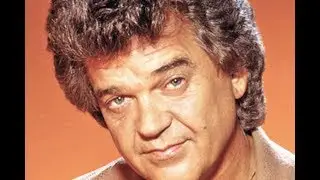 Conway Twitty - Between Her Blue Eyes And Jeans