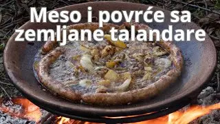 Meso i povrće na zemljanoj talandari